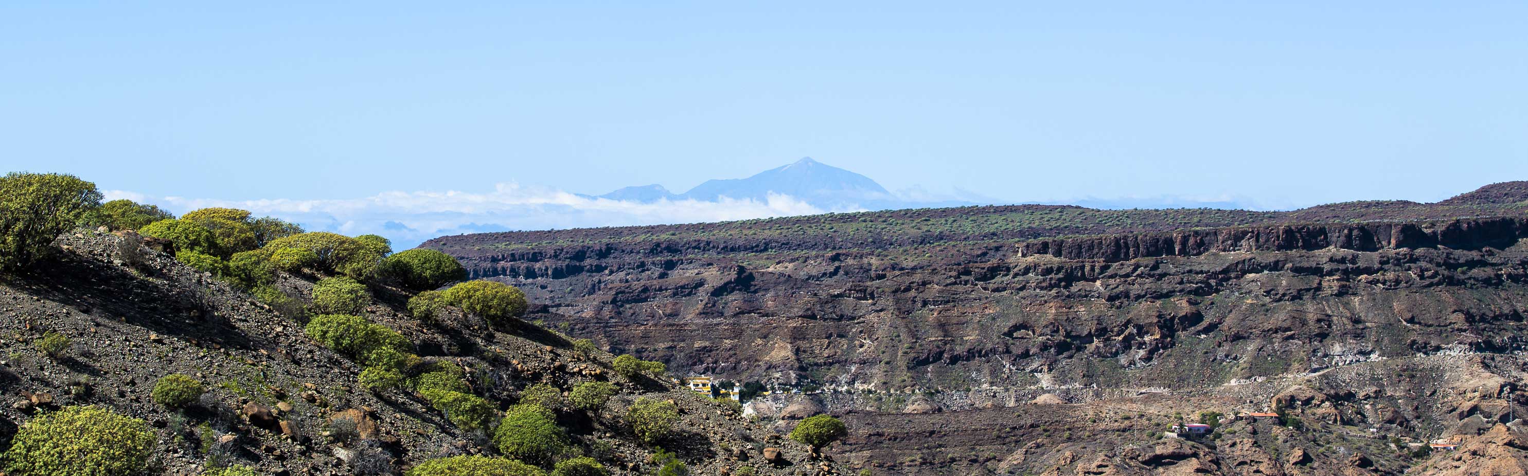 Mountain landscape of Gran Canaria with Pico del Teide in the distance